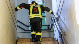Fireman climbing stairs
