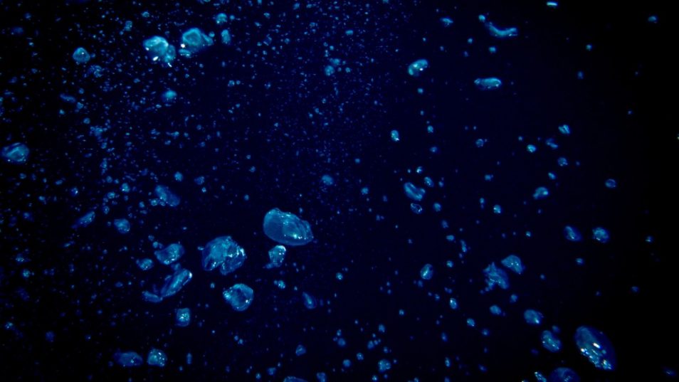 Air bubbles in ocean, dark blue